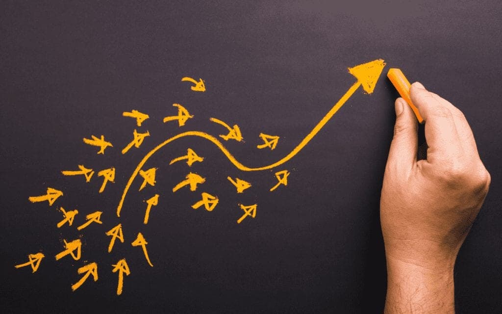 hand-drawn yellow arrow pointing up to the right